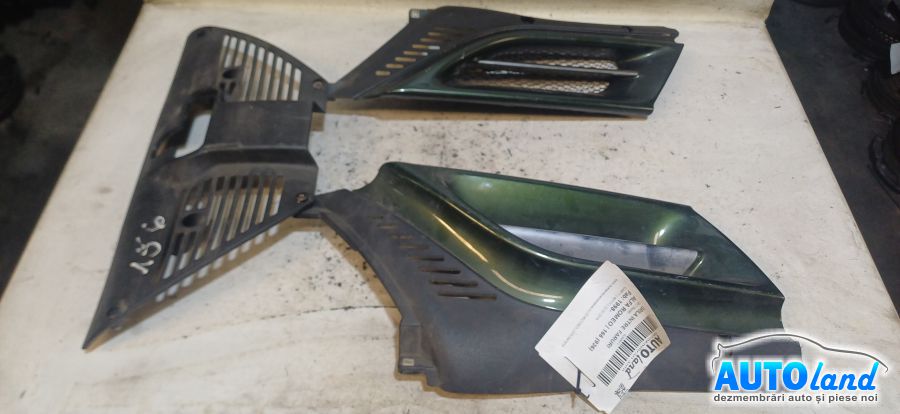 Grila Intre Faruri ALFA ROMEO 166 (936) 1998-2026 Cod 1560172210 