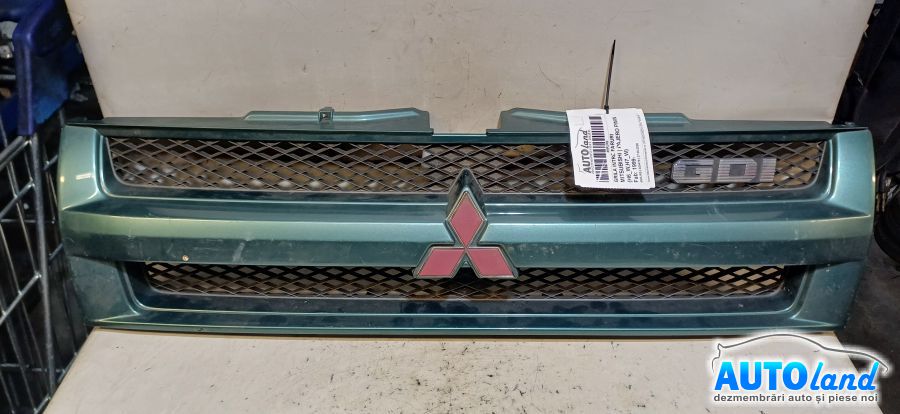 Grila Intre Faruri MITSUBISHI PAJERO PININ (H6_W,H7_W) 1999-2026 Cod MR322536 
